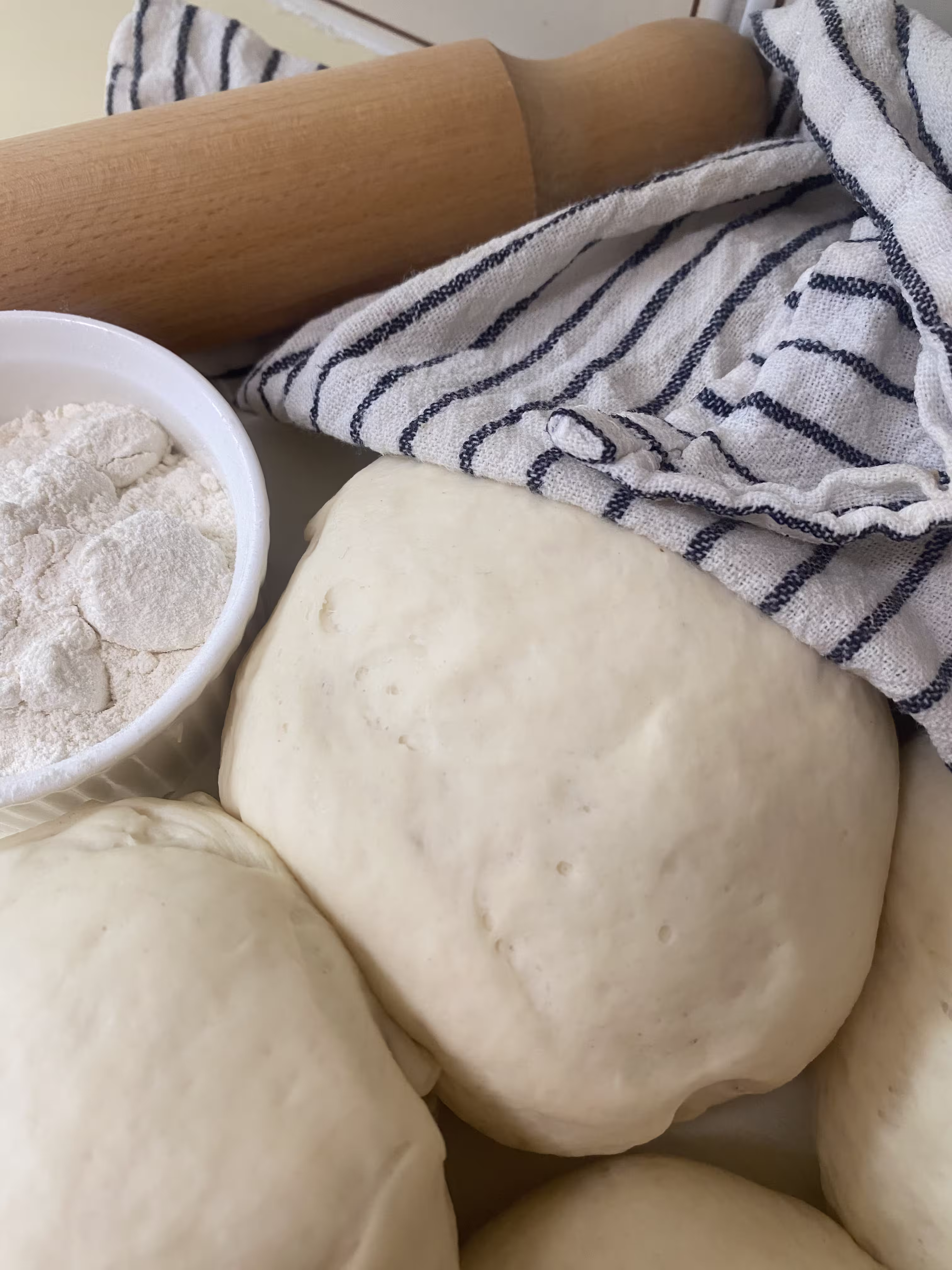 Photo of balls of pizza dough